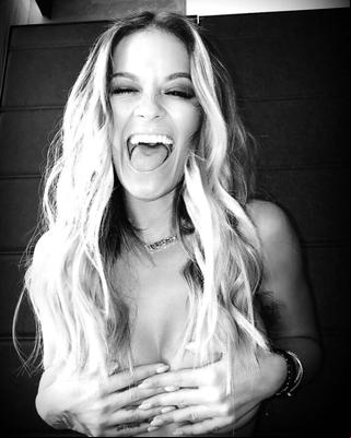 Rita Ora topless